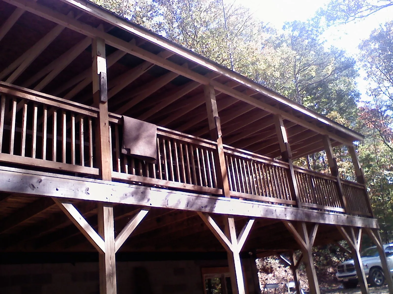 Timber framing under a new elevated porch and deck — Roof Leak Repair in Farmingville by Roofing Brothers